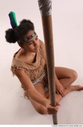 ANISE SITTING POSE WITH SPEAR